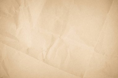 Kahverengi geri dönüşümlü Kraft kağıdı buruşmuş eski doku arkaplanı harf olarak kullanılıyor. Soyut parşömen eski retro sayfa grunge boş gazete. Krem deseni pürüzlü grunge yüzey arkaplanı kopyalama alanı ile.