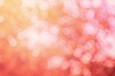 Soyut bulanık turuncu renk ve arkaplan şeftalisi, Görüntü festivali ışıkları açık hava ve pembe baloncuk odaklı desen dekorasyonu.