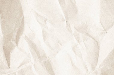 Eski kağıt. Buruşmuş kağıt dokusu. Kahverengi geri dönüşümlü Kraft kağıdı buruşmuş eski doku arkaplanı harf olarak kullanılıyor. Yıllanmış kağıt. Soyut parşömen eski retro sayfa grunge boş gazete. Krem deseni pürüzlü grunge yüzey arkaplanı kopyalama alanı ile.