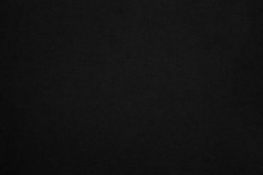 Black paper texture background. Black blank cardboard sheet page. Old vintage page dark grunge vignette. Pattern rough art rustic grunge letter. Material cardboard with copy space for luxury text.