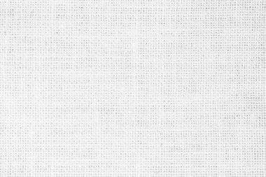 White fabric cloth texture cover bed. Cotton gauze and linen clean pattern background. Natural jute hessian sackcloth canvas woven organic bleached white color tablecloth blank for decorative.