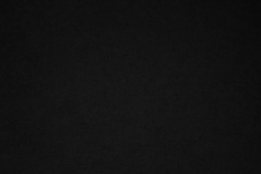 Black paper texture background. Black blank cardboard sheet page. Old vintage page dark grunge vignette. Pattern rough art rustic grunge letter. Material cardboard with copy space for luxury text.