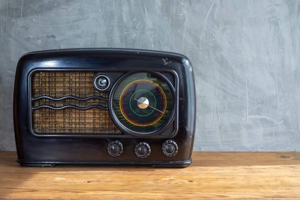 Old fashion style vintage radio over retro background with copyspace design. Hipster design audio music radio.