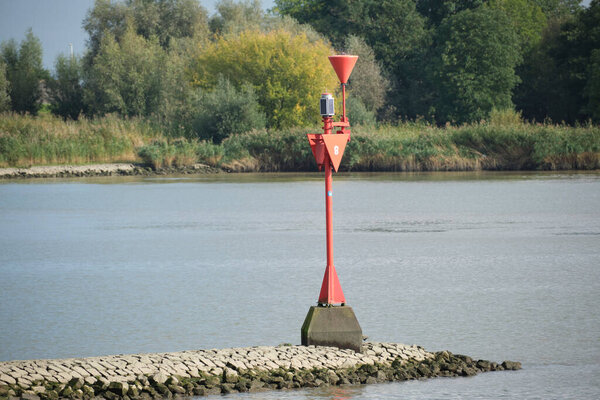 Coastal traffic control tower with navigation signs.