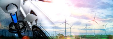Yeşil sürdürülebilir enerji kavramında elektrikli araba için EV şarj istasyonu
