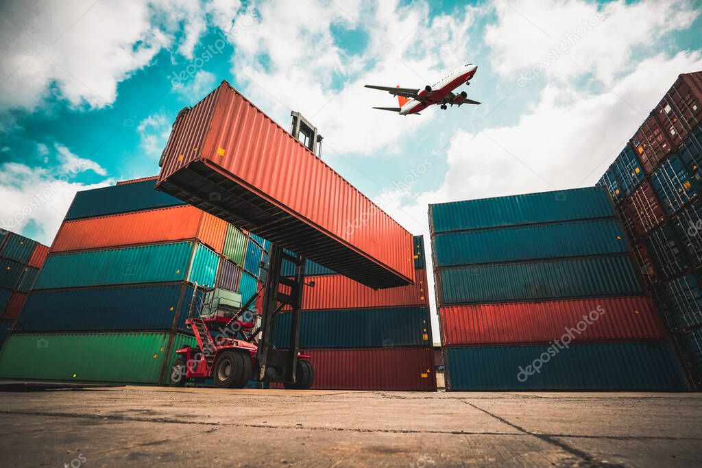 Cargo container for overseas shipping in shipyard with airplane in the sky .