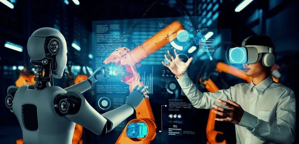 Mechanized industry robot en menselijke werknemer werken samen in toekomstige fabriek — Stockfoto
