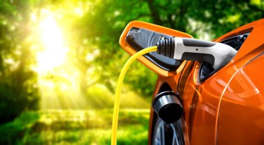 Yeşil enerji ve ekolojik güç kavramında elektrikli araba şarj istasyonu