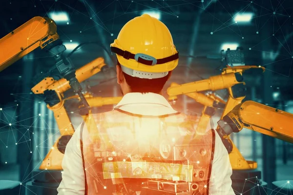 Mechanizovaný průmysl robot rameno a továrna pracovník dvojitá expozice — Stock fotografie