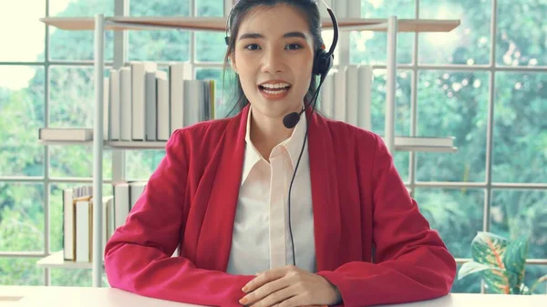 Video call camera view of businesswoman talks actively in videoconference