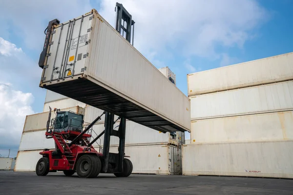 Cargo container for overseas shipping in shipyard with heavy machine .