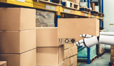 Yenilikçi endüstri robotu insan işçiler için depoda çalışıyor.