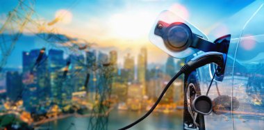 Yeşil enerji ve ekolojik güç kavramında elektrikli araba şarj istasyonu