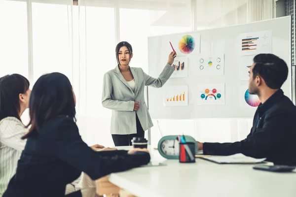 Business people proficiently discuss work project while sitting in circle — Stock Photo, Image