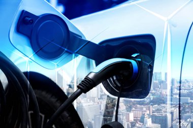 Yeşil sürdürülebilir enerji kavramında elektrikli araba için EV şarj istasyonu