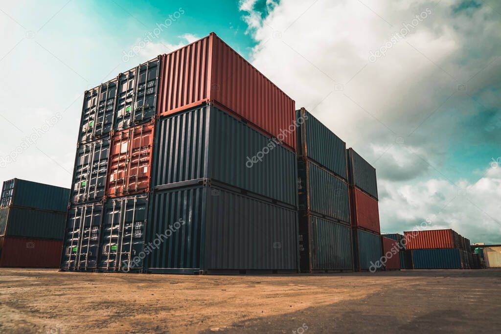 Cargo container for overseas shipping in shipyard with heavy machine .