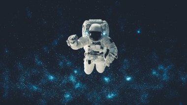 Astronot uzay yürüyüşü yaparken uzay uçuşları görevinde çalışıyor.