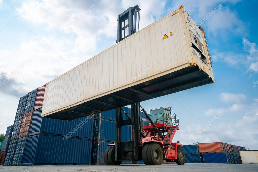 Cargo container for overseas shipping in shipyard with heavy machine .