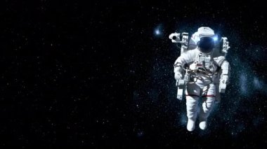 Astronot uzay yürüyüşü yaparken uzay uçuşları görevinde çalışıyor.