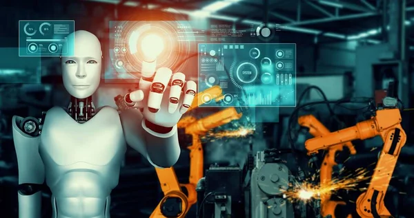 Mechanisierte Industrieroboter und Roboterarme für die Montage in der Fabrikproduktion . — Stockfoto