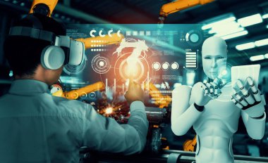 Mekanize endüstri robotu ve insan işçileri gelecekteki fabrikada birlikte çalışıyorlar.