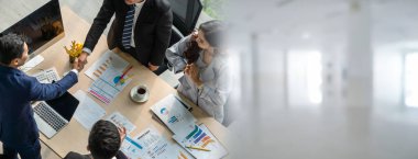 Group business people handshake at meeting table in widen view