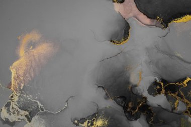 Kağıt üzerinde mermer sıvı mürekkep resminin koyu altın soyut arkaplanı .