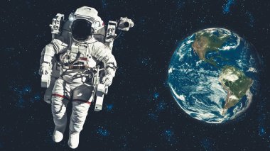 Astronot uzay yürüyüşü yaparken uzay uçuşları görevinde çalışıyor.