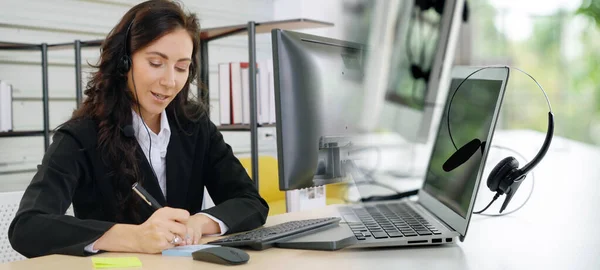 Business people wearing headset working in office broaden view — Stock Photo, Image