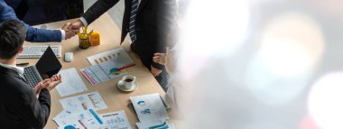 Group business people handshake at meeting table in widen view