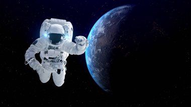 Astronot uzay yürüyüşü yaparken uzay uçuşları görevinde çalışıyor.