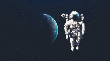 Astronot uzay yürüyüşü yaparken uzay uçuşları görevinde çalışıyor.
