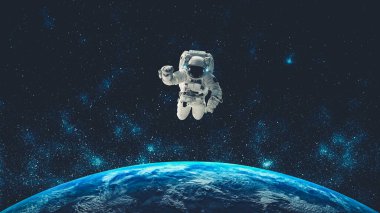 Astronot uzay yürüyüşü yaparken uzay uçuşları görevinde çalışıyor.