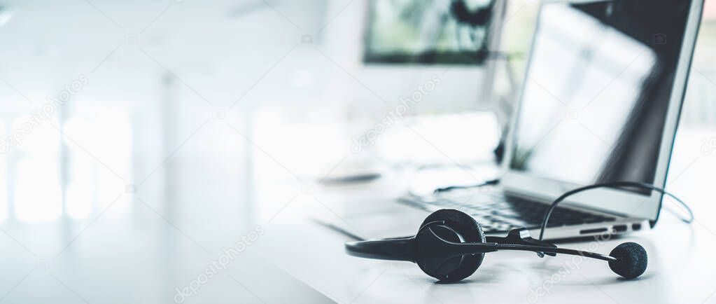 Headset and customer support equipment at call center ready for actively service