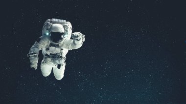 Astronot uzay yürüyüşü yaparken uzay uçuşları görevinde çalışıyor.