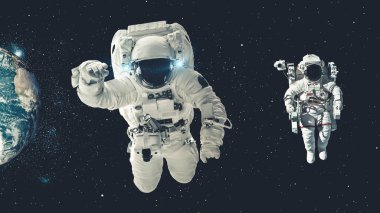 Astronot uzay yürüyüşü yaparken uzay uçuşları görevinde çalışıyor.