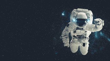 Astronot uzay yürüyüşü yaparken uzay uçuşları görevinde çalışıyor.