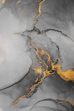 Kağıt üzerinde mermer sıvı mürekkep resminin koyu altın soyut arkaplanı .