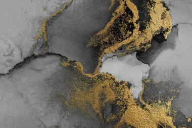 Kağıt üzerinde mermer sıvı mürekkep resminin koyu altın soyut arkaplanı .