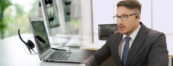 Business people wearing headset working in office broaden view — Stock Photo, Image