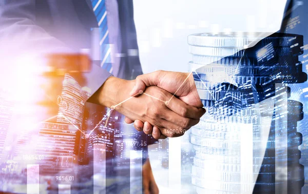 Business handshake on finance prosperity and money technology asset background . Economy and financial growth by investment in valuable stock market to gain wealth profit form currency trading