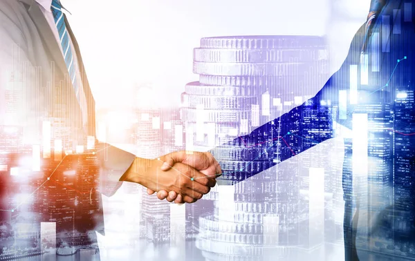 Business handshake on finance prosperity and money technology asset background . Economy and financial growth by investment in valuable stock market to gain wealth profit form currency trading