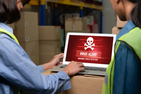 Computer with green screen display in warehouse storage room . Delivery and transportation software concept .