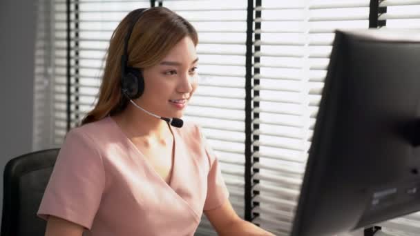 Competent Female Operator Working Computer While Talking Clients Concept Relevant — 图库视频影像