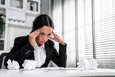 A competent female employee who has become completely exhausted as a result of overburdened work. Concept of unhealthy life as an office worker, office syndrome, effect from overwork.