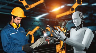 Cybernated industry robot and human worker working together in future factory . Concept of artificial intelligence for industrial revolution and automation manufacturing process .