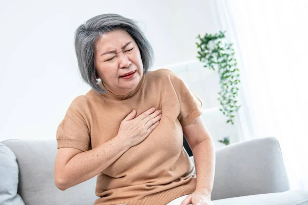 Agonizing Elderly Woman Experiencing Chest Pain Medical Attention Senior Care — Stockfoto