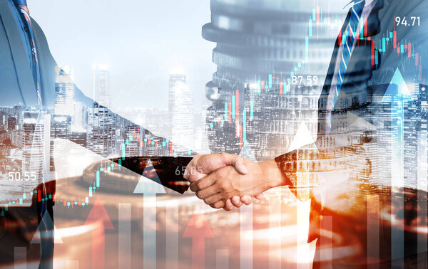 Business handshake on finance prosperity and money technology asset background . Economy and financial growth by investment in valuable stock market to gain wealth profit form currency trading