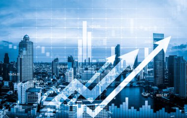 Financial graphs and digital indicators overlap with modernistic urban area, skyscrabber for stock market business concept. Double exposure.