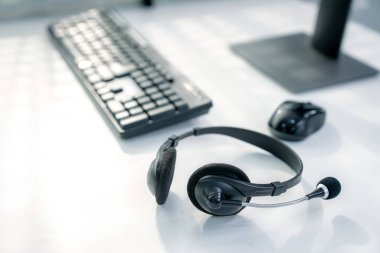 Essential equipment concept for competent online operators, call service agents, or online working. Customer service equipment, as well as helpdesk tools.